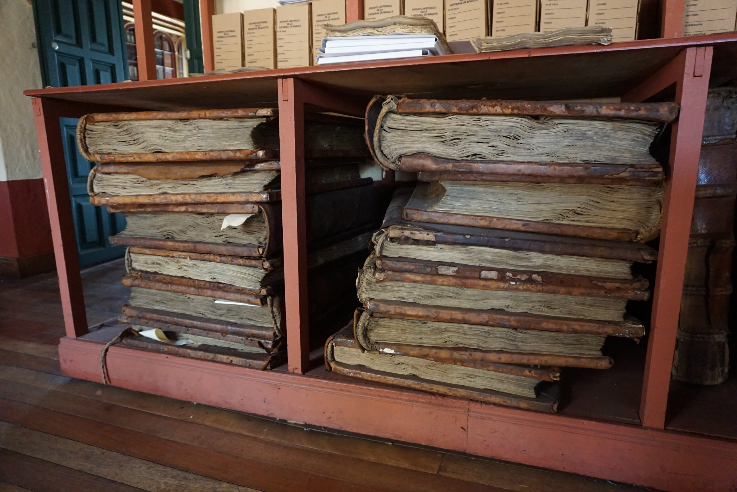 Very large old books in the archive of the National Cathedral in Bogotá