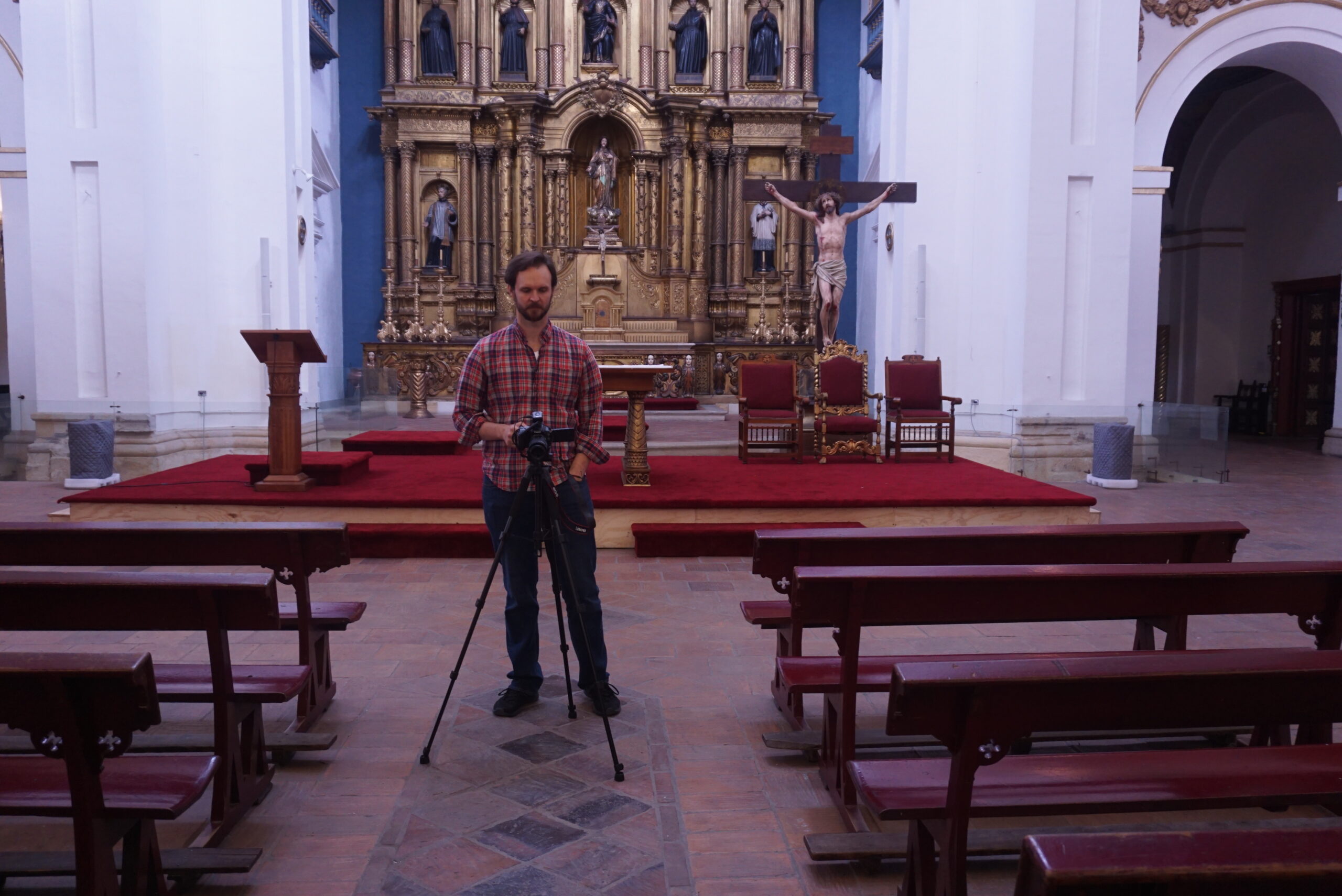 Justin Johnson taking photographs to use in the photogrammetry reconstruction of the church