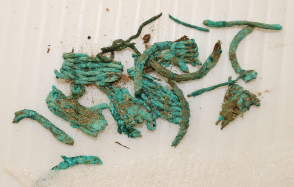 Textile fragments with oxidized metallic threads recovered from a burial at San Ignacio